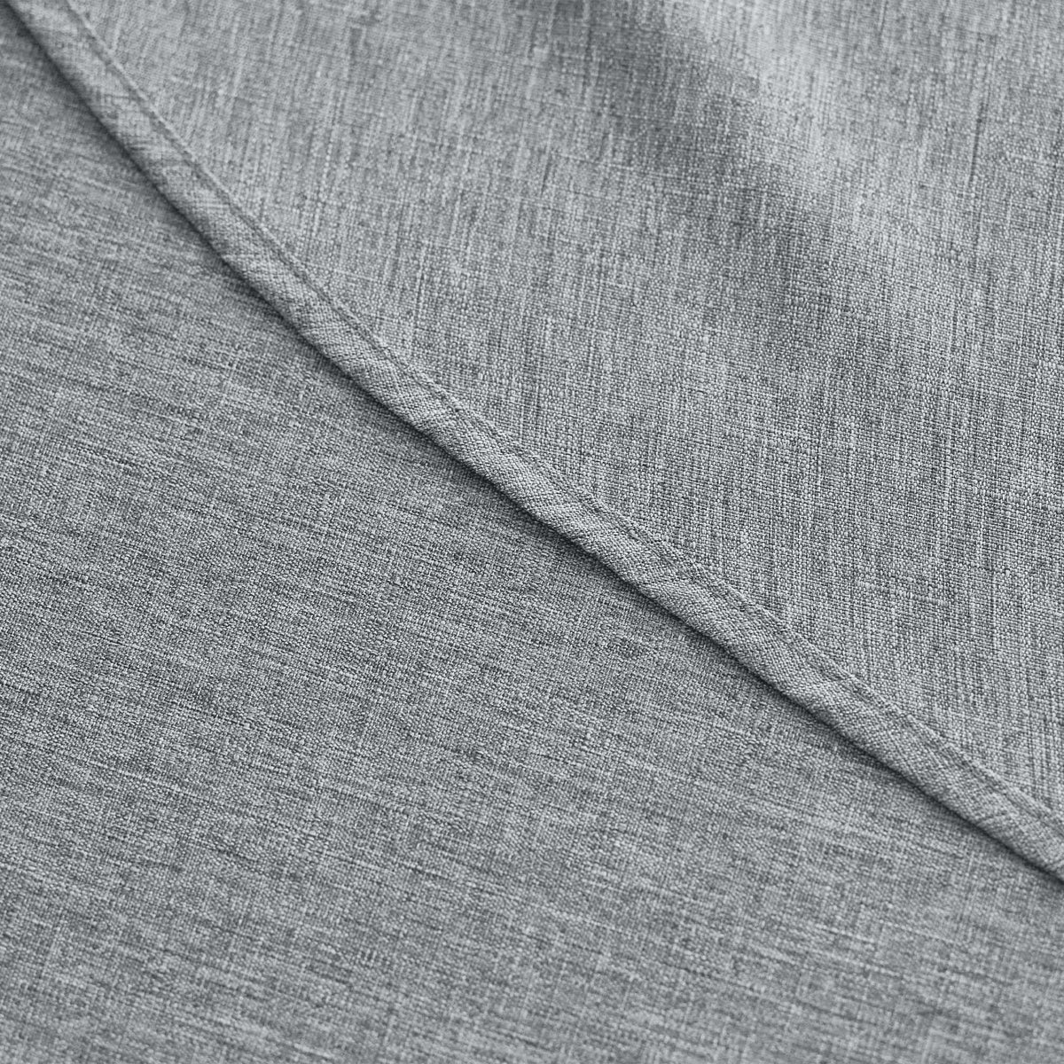 Decorelia cool grey tablecloth on outdoor table showcases weather-friendly, wipe-clean practicality.