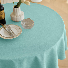 Decorelia aqua round tablecloth on a dining setup.