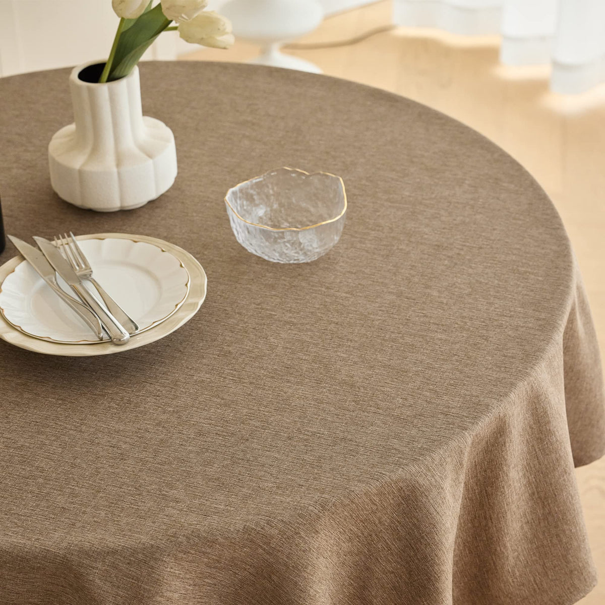 Decorelia indoor-outdoor round tablecloth on a patio setting
