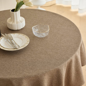 Decorelia indoor-outdoor round tablecloth on a patio setting