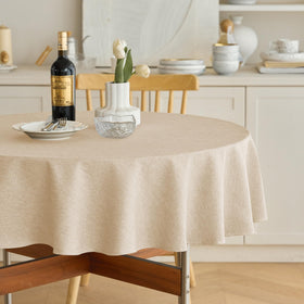 Decorelia waterproof round tablecloth in beige; easy spill cleanup for outdoor dining.