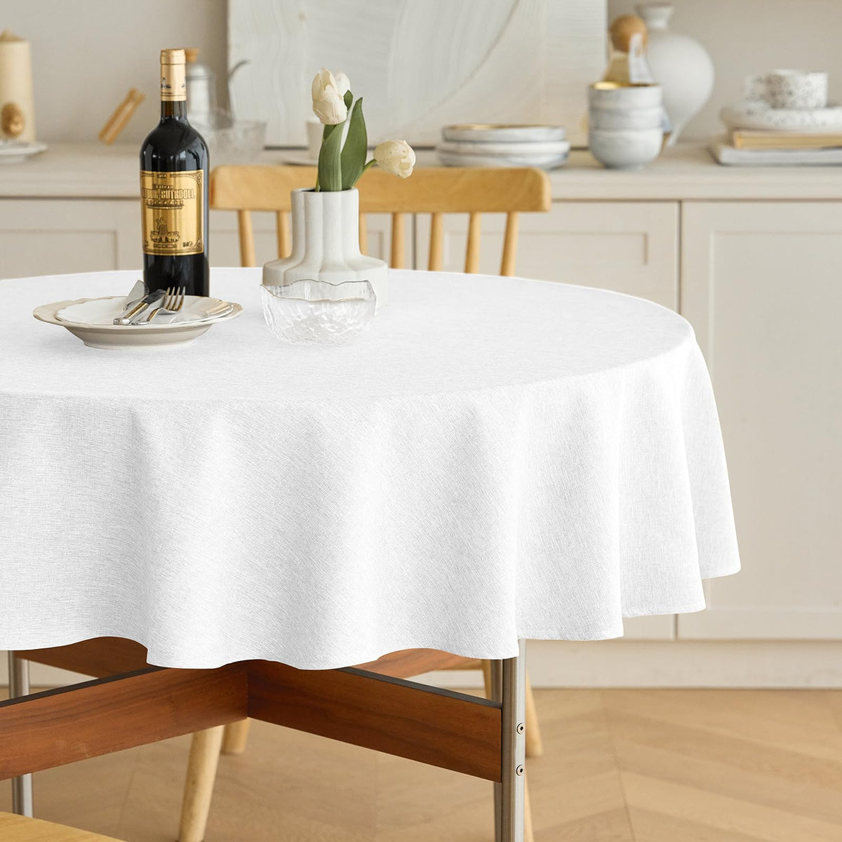 Decorelia white round tablecloth 60-inch waterproof protects surfaces from spills.