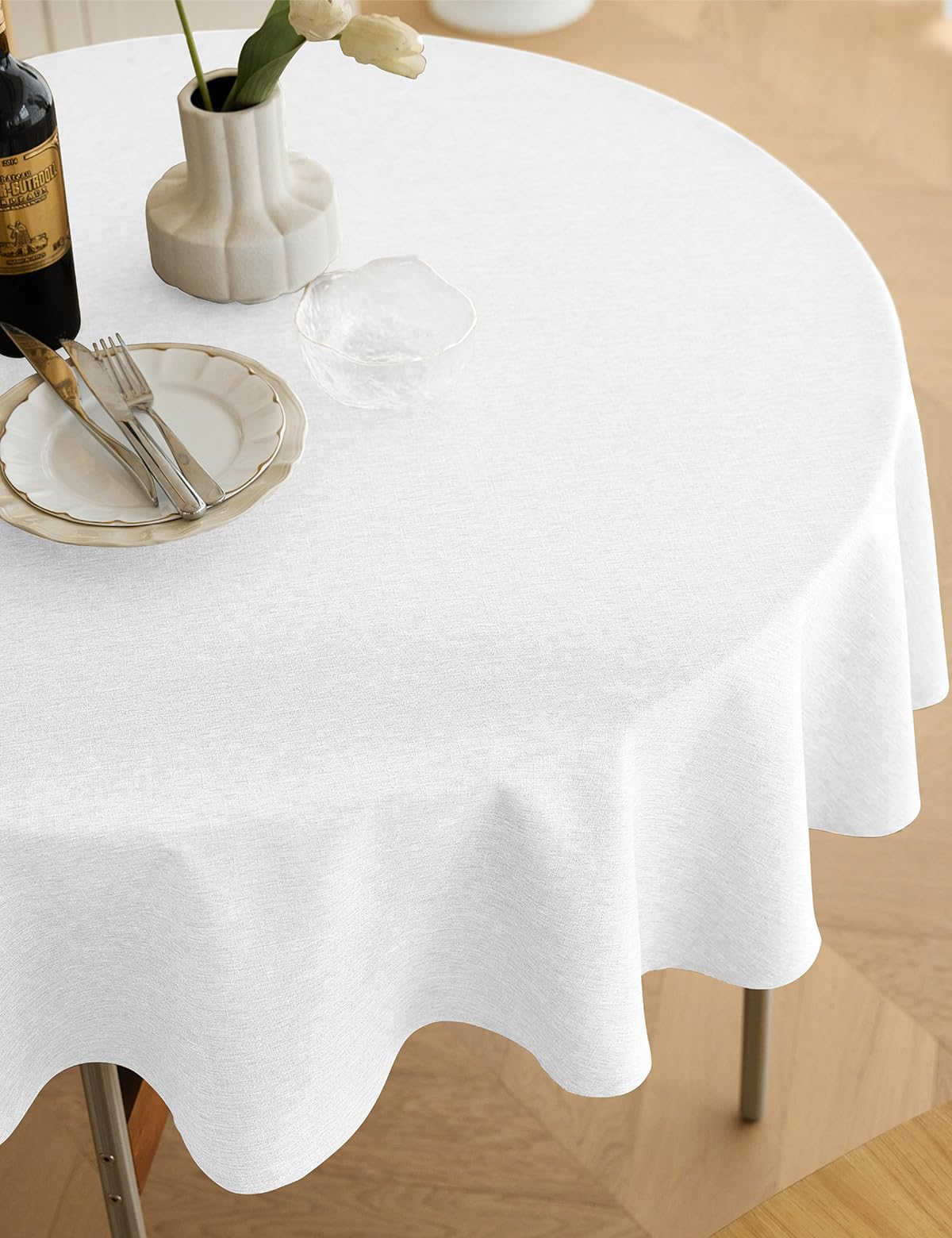 Decorelia linen-style round tablecloth offers wrinkle-free elegance for gatherings.