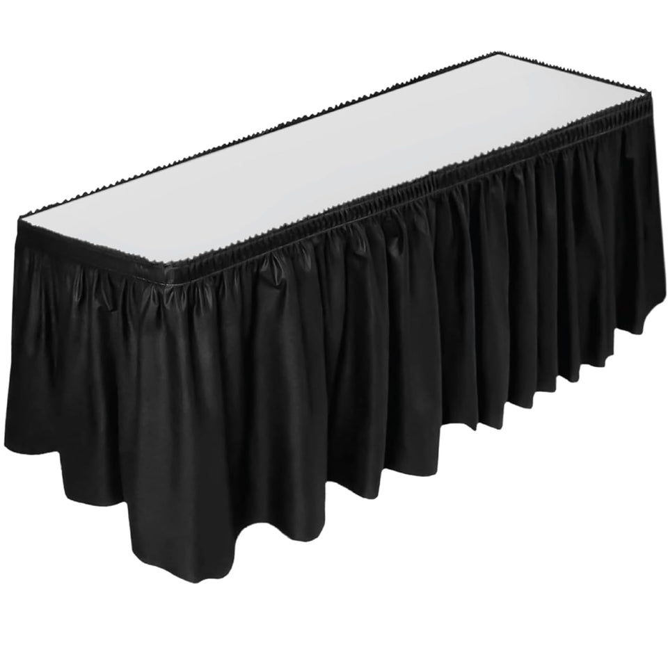 DecorRack black table skirt drapes a 29in by 14ft table for a polished event backdrop