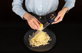 Deiss PRO zesting garlic, lemon, or ginger for vibrant kitchen flavors.