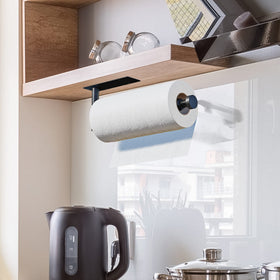 DEKAVA under-cabinet self-adhesive installation demonstrates easy mounting on various walls.