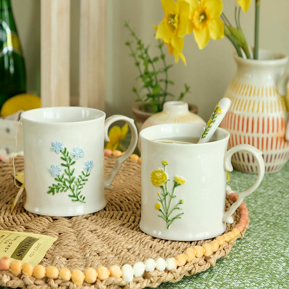 Delights Galore two-pack mug with yellow and blue flowers for cozy mornings.