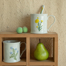 Large-capacity Delights Galore mug ideal for cappuccino or hot chocolate.