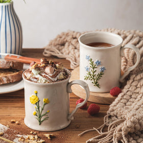 Microwave-safe Delights Galore ceramic mug for quick heat-and-serve moments.