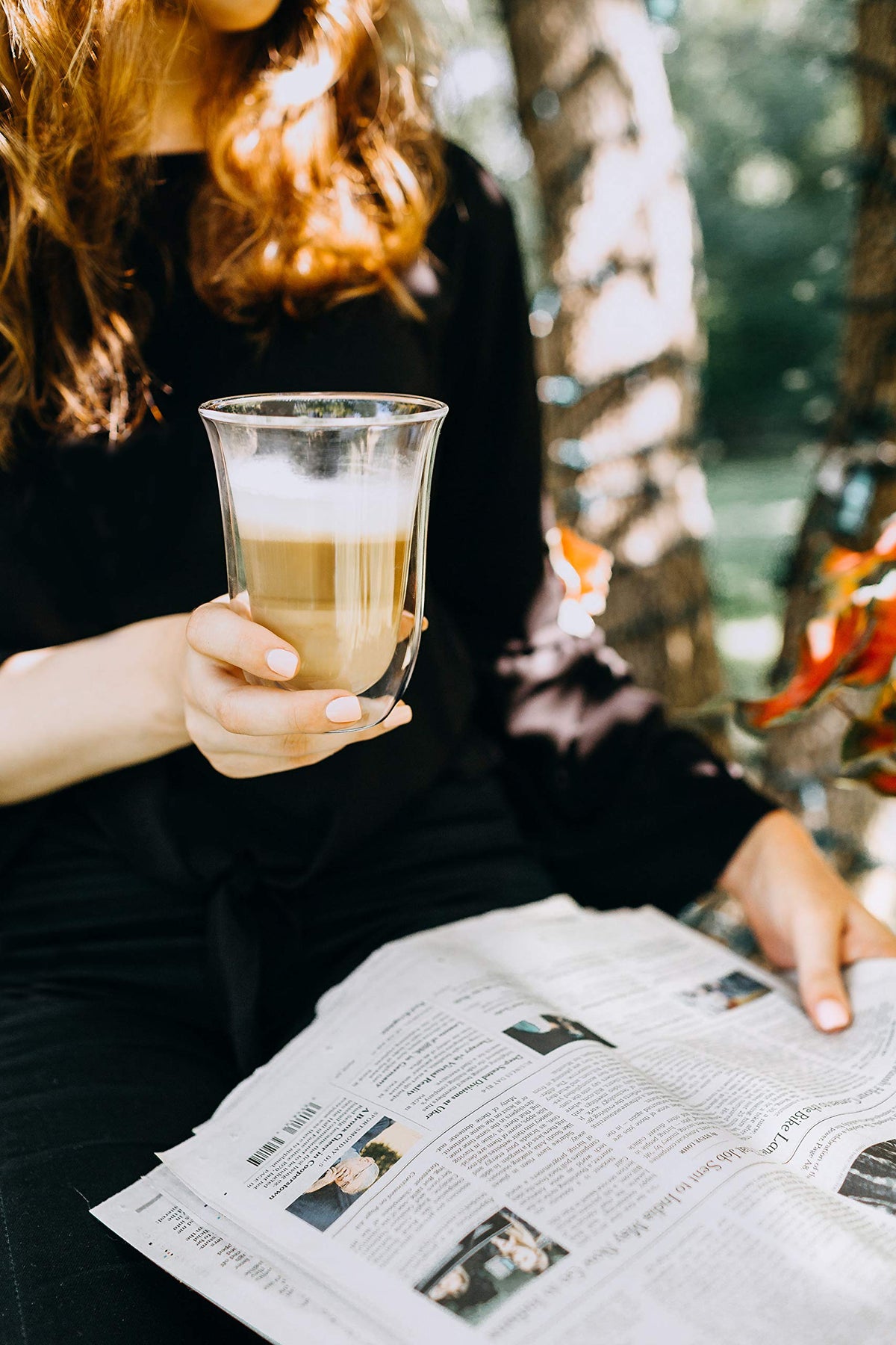 De'Longhi latte glass set showcases condensation-free exterior for cold drinks.