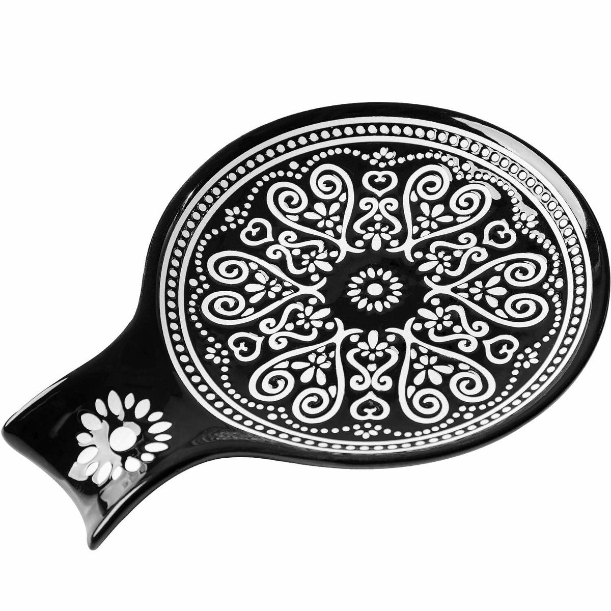 Delpnana ceramic spoon rest with large black pattern on countertop keeps utensils organized