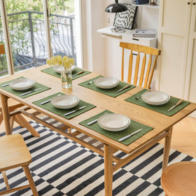 Demetex Green placemats sized 13 by 19 inches fit most dining setups.