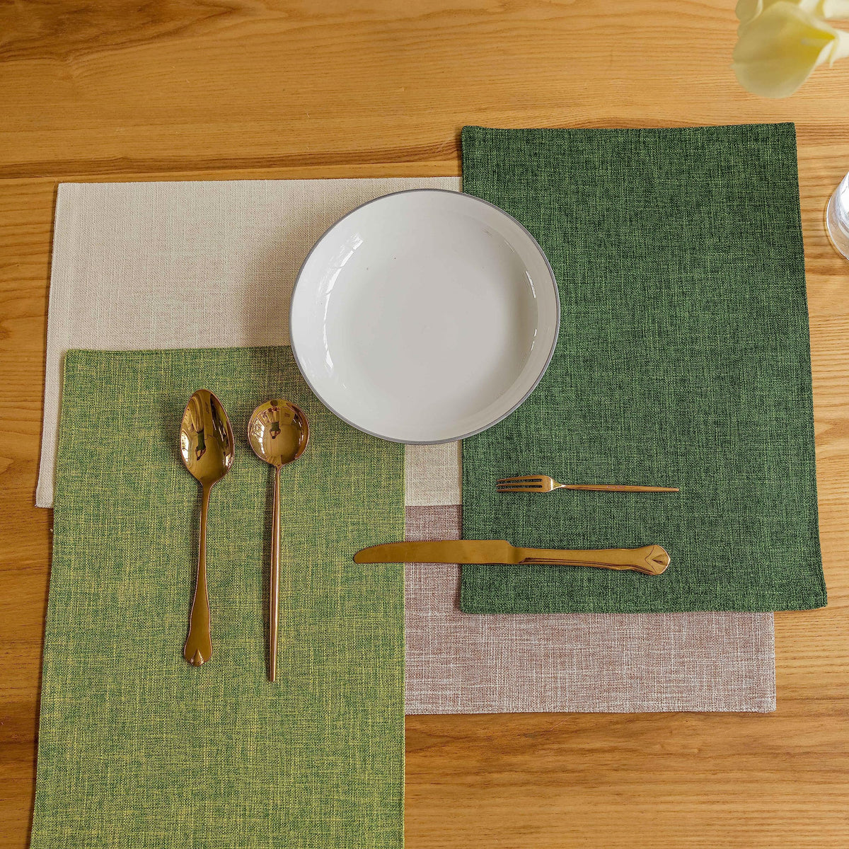 Demetex green placemats pair with wooden or glass tables beautifully