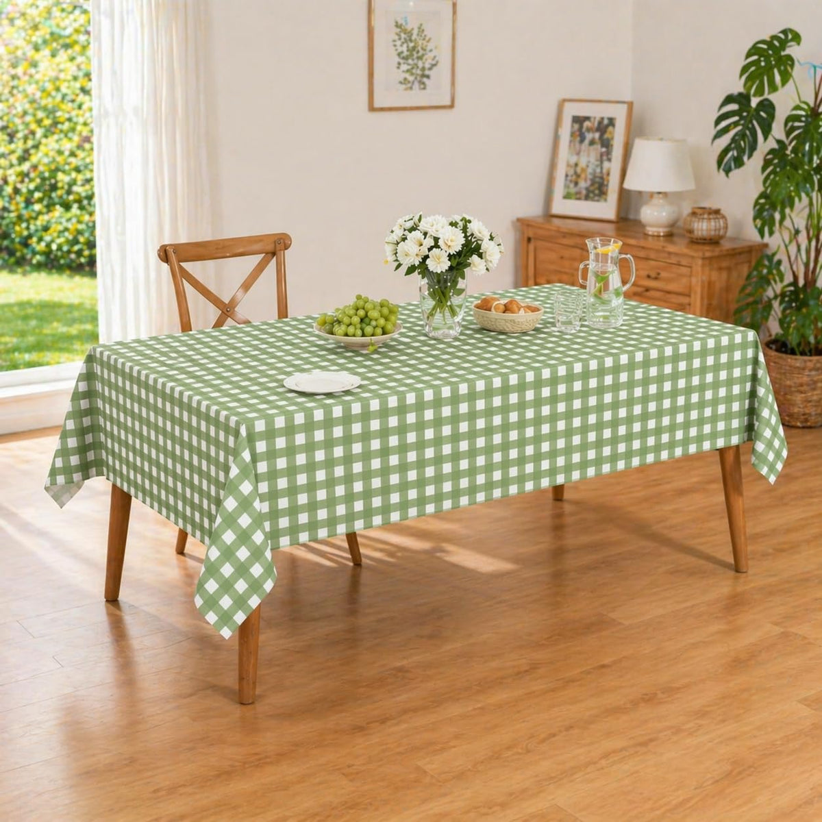 Denwiller sage green gingham tablecloth at an outdoor picnic setup