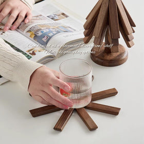 DEOLD walnut-toned trivet complements cookware and kitchen decor.