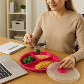 Dependable Essentials vented lid close-up demonstrates steam release for mess-free reheating.