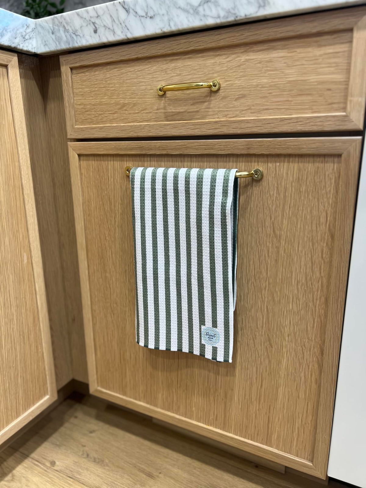 Desert Aqua compact folding towel saves space in small kitchens