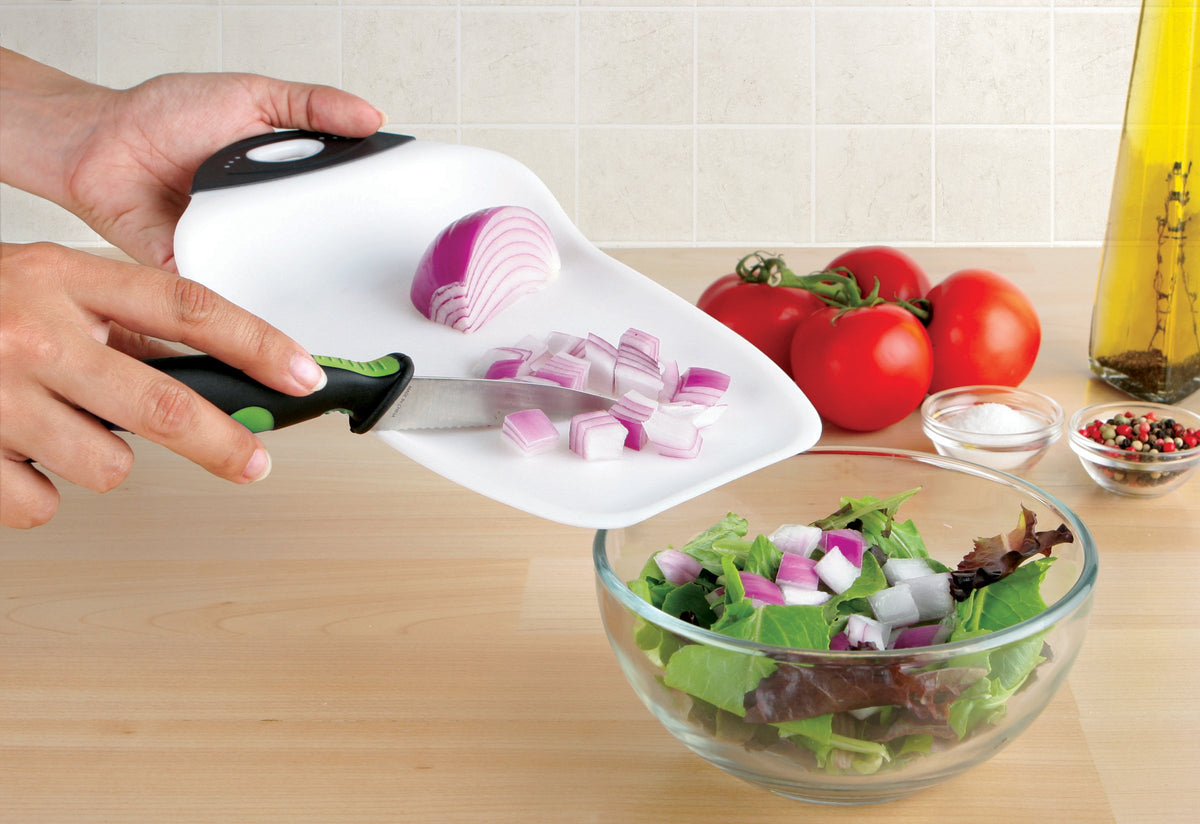 Dexas Chop and Scoop board grip handle shown for comfortable lifting and scooping.