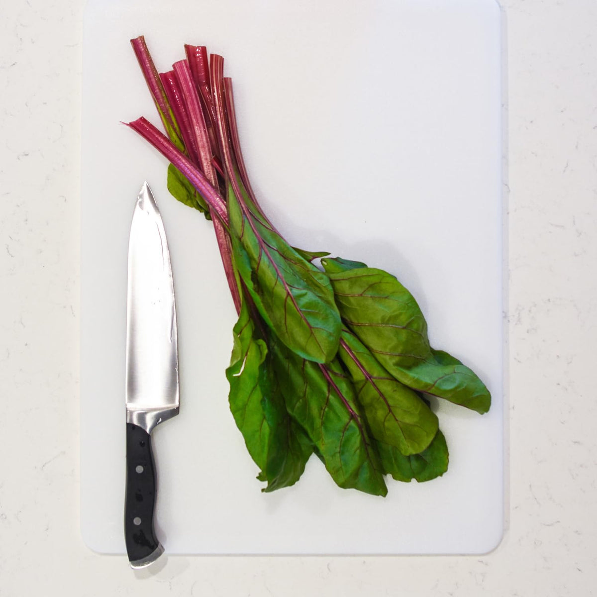 Dexas Polysafe cutting board with non-slip, reversible design for stable chopping