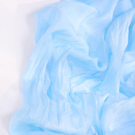 DeZerlor Baby Blue Cheesecloth Table Runner edge-stitching ensures durable edges for repeated use.