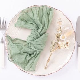 DeZerlor sage green napkins boat fold adds decorative flair