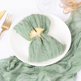 DeZerlor sage green napkins pocket fold for elegant place settings