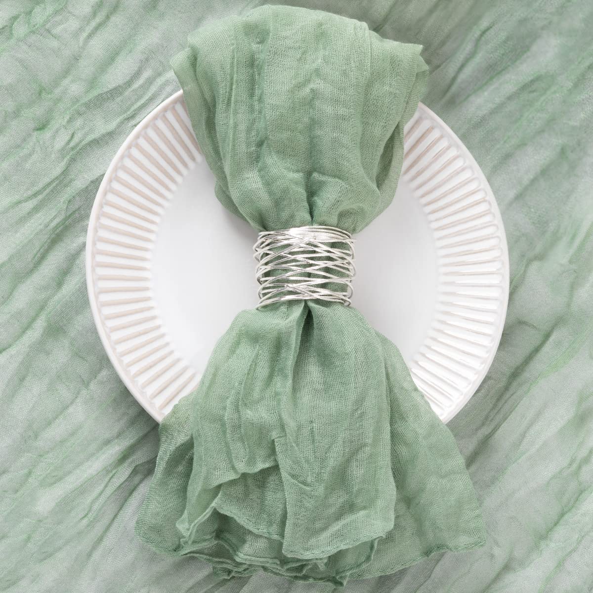 DeZerlor sage green napkins rose fold for romantic centerpiece