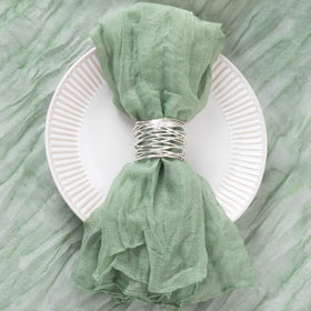 DeZerlor sage green napkins rose fold for romantic centerpiece