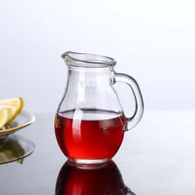 Multi-purpose pitcher for syrups, honey, or au jus.