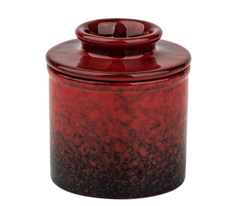 dgudgu butter keeper with red lid and water seal on counter, keeps butter soft.