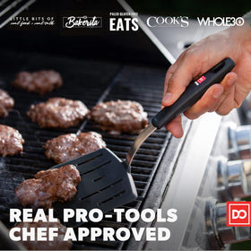 Di Oro Living 600°F heat-resistant silicone spatula handling high-heat cooking.