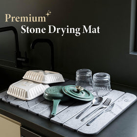 Diakitch stone drying mat in use for drying dishes and utensils efficiently.