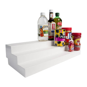 Dial Industries 3-tier adjustable shelves in cabinet for easy access to staples.
