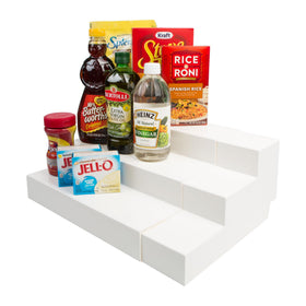 Dial Industries 3-tier adjustable shelves assembling canned goods in a cabinet for clear visibility