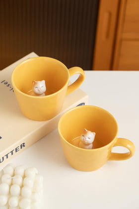 Bright yellow glaze adds sunny vibes to tea or coffee