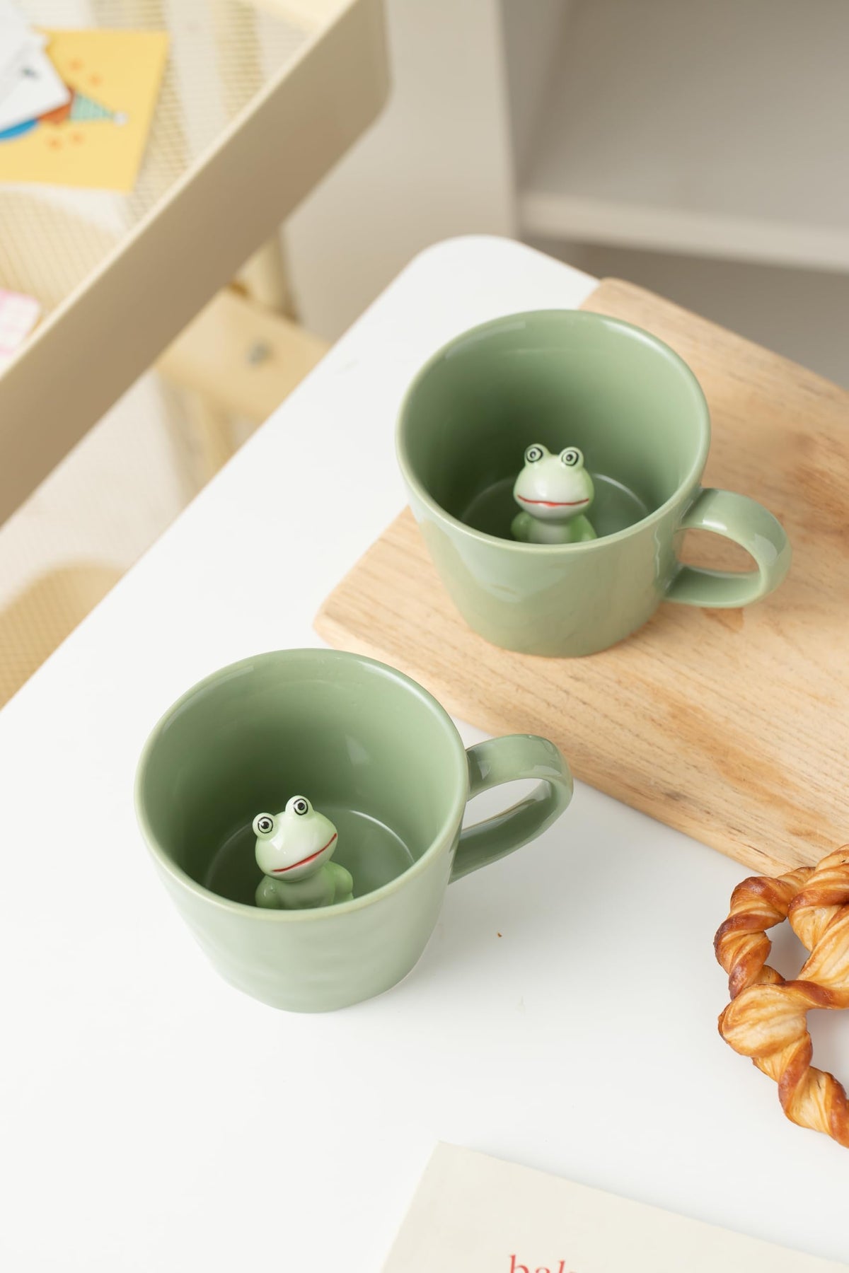 Bottom snail detail on the frog mug slowly reveals itself as you sip