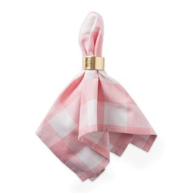 Close-up of DII buffalo check napkins showing pink-and-white plaid texture