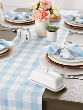 DII buffalo check runner pairs with blue and white dinnerware.