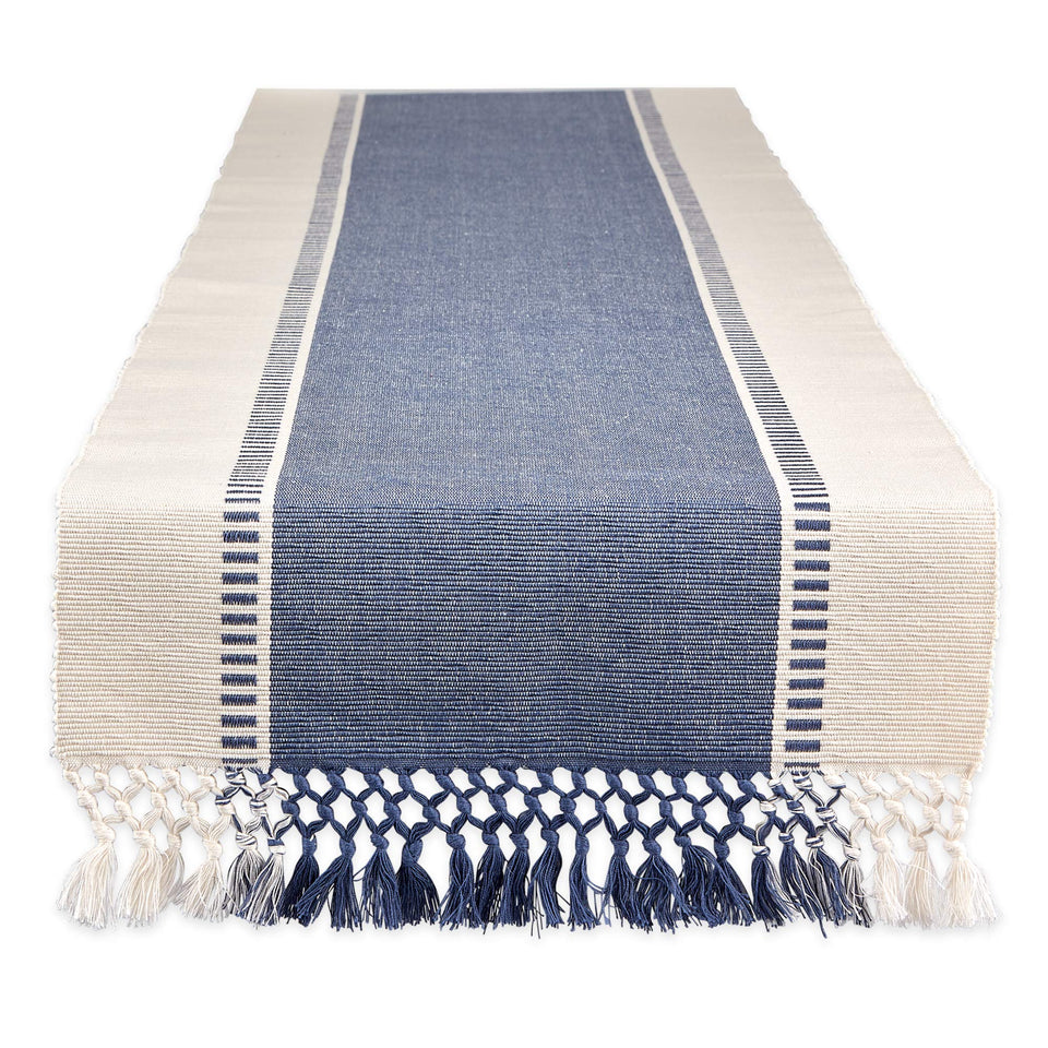 DII dobby stripe table runner with blue fringe enhances dining ambiance.