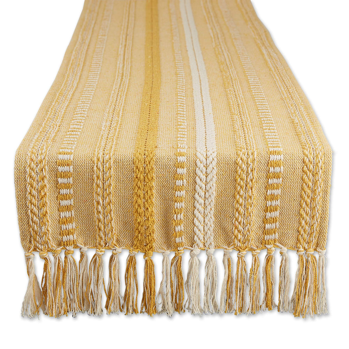 DII Farmhouse braided stripe table runner on a dining table for rustic warmth.
