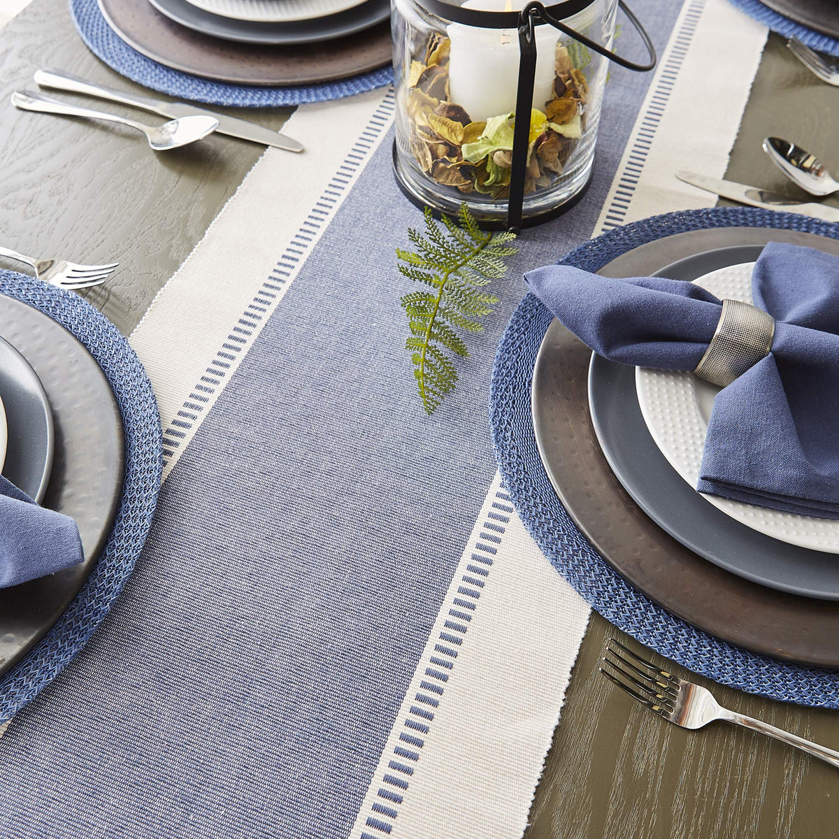 DII fringe close-up shows macrame-style detail and craftsmanship.