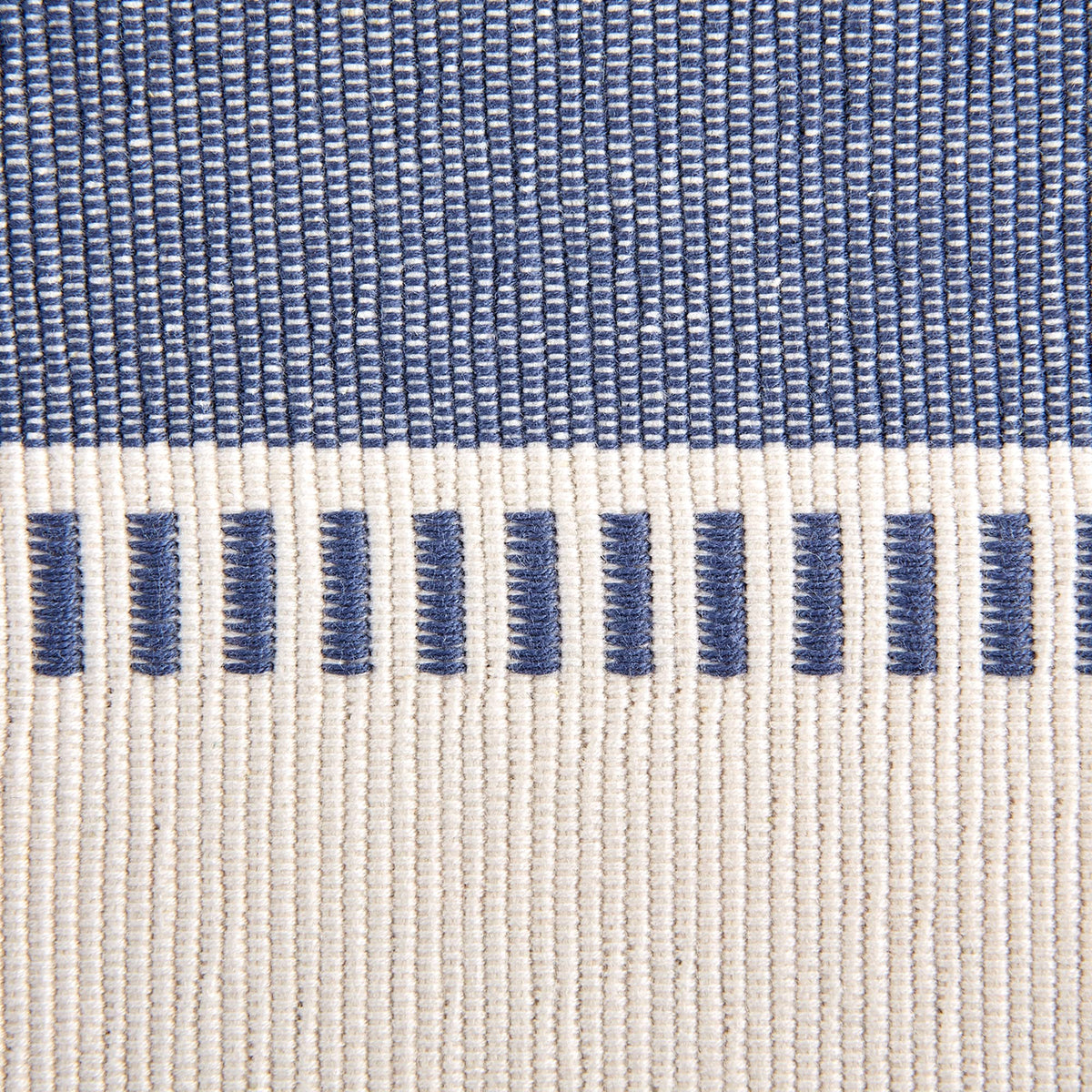 DII ribbed dobby stripe fabric yields colorfast style for versatile tables.