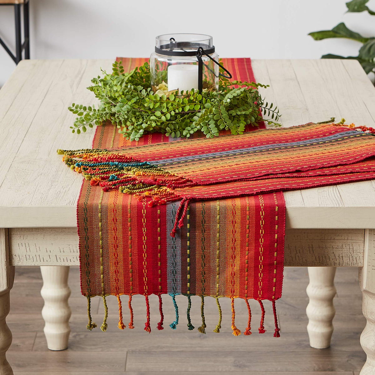 Table setting featuring DII Spice runner with simple plates and decor