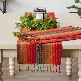 Table setting featuring DII Spice runner with simple plates and decor