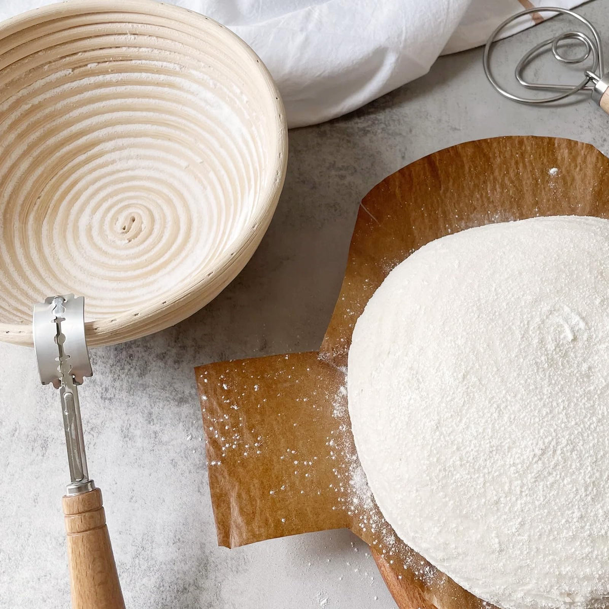 Dimpola banneton basket flour dusting shows proper nonstick surface preparation