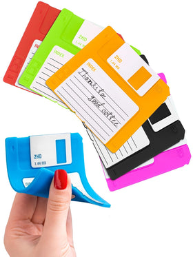 DIMROM floppy-disk coaster set on a desk for retro flair and surface protection.