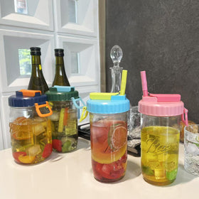 DIPESI lid compatible with Ball and Kerr wide-mouth jars.