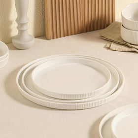 Dizada white porcelain complements any kitchen style during gatherings.