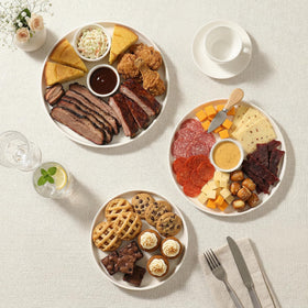 Dizada stacked platters save space while organizing a well-curated spread.