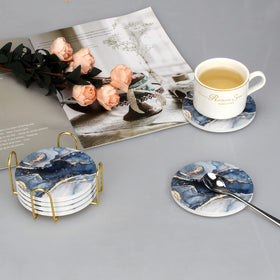 Dksyee set stored in gold holder, helping keep coffee table tidy.